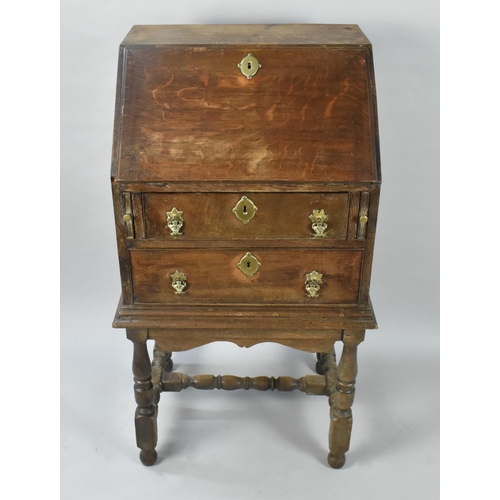 69 - A 19th Century Oak Bureau of Small Proportions Having Hinged Front to Fitted Interior Surmounting Tw... 