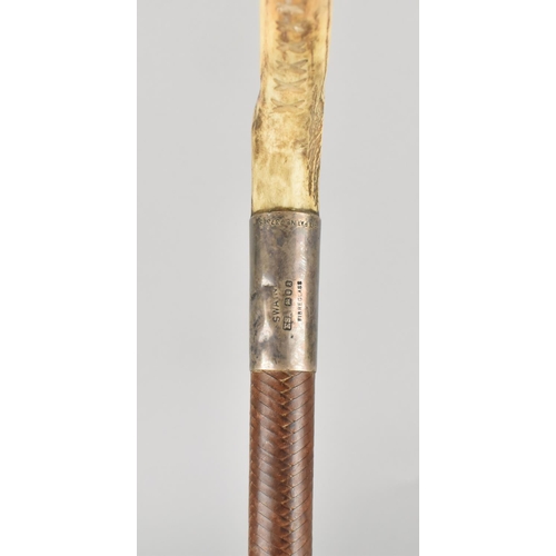 92 - A George V Swaine and Adeney Hunting Crop with Horn Handle, Silver Collar, Brown Leather Shaft and T... 