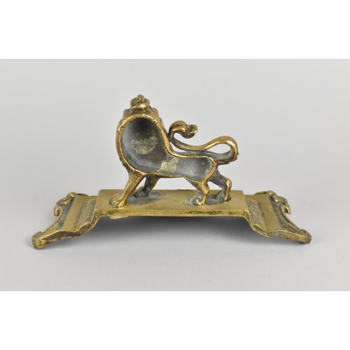 11 - A 19th Century Brass Doorstop Modelled as Lion on Stepped Plinth to Scrolled Acanthus Base, 17x9cms ... 