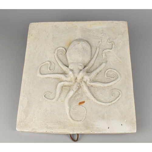 125 - A Victorian Cast Plaster Octopus 'Trade' Plaque, 28x31cms