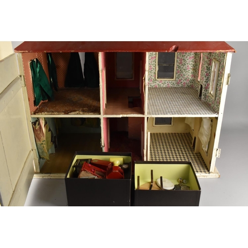 200 - A Vintage Doll House In Need of Restoration with Various Accessories, 70cms Wide, Together with a La... 