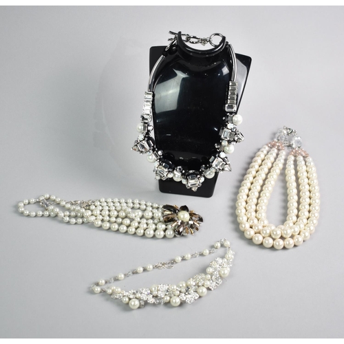 243 - A Contemporary Butler and Wilson Faux Pearl Necklace together with Three Similar Costume Jewellery N... 