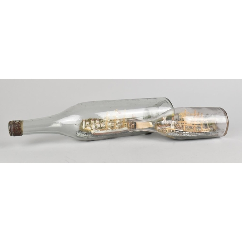 30 - A Early/Mid 20th Century Ship in a Bottle, 30cms High together with a Smaller Example, 18.5cmms High