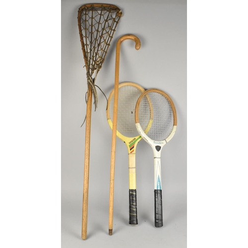 A Vintage Lacrosse Stick, Two Rackets and a Walking Stick