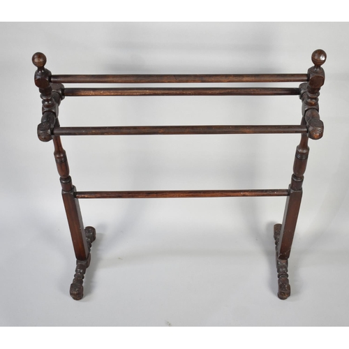 73 - A Late 19th/Early 20th Century Stained Pine Towel Rail, 68x83cms High