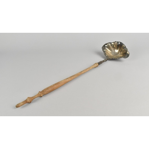 79 - A Late 19th/Early 20th Century Ladle of Scrolled Form with Turned Wooden Handle, the Bowl Stamped In... 