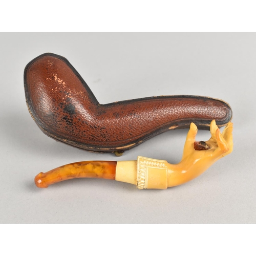 9 - A Cased Victorian Carved Meerschaum Pipe Modelled as a Hand with Amber Mouthpiece, Condition Issues