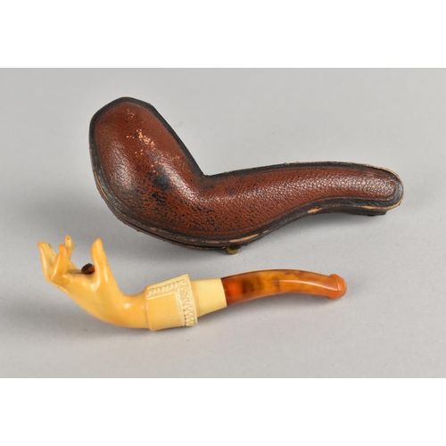 9 - A Cased Victorian Carved Meerschaum Pipe Modelled as a Hand with Amber Mouthpiece, Condition Issues