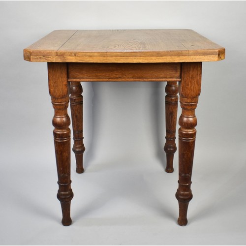 70 - An Early 20th Century Oak Square Topped Table on Turned Supports, 69cms Square Top by 73cms High