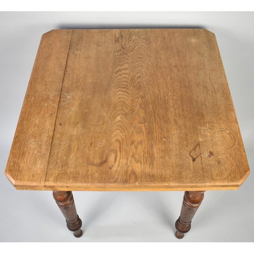 70 - An Early 20th Century Oak Square Topped Table on Turned Supports, 69cms Square Top by 73cms High