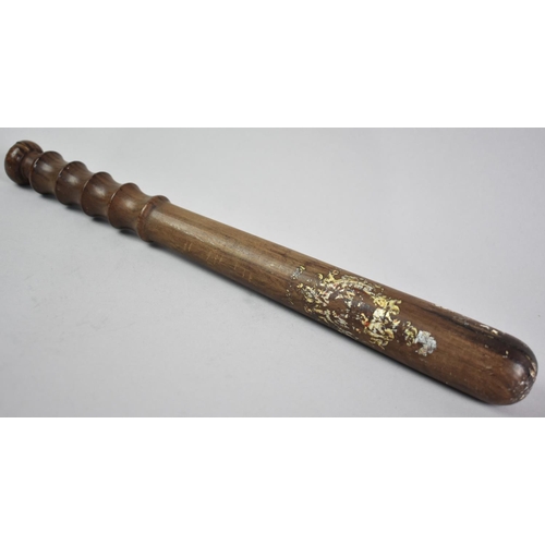 1 - A Turned Wooden Police Truncheon with Remnants of The Original Painted Crest, 38cms Long