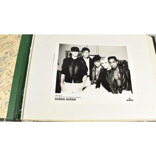 232 - Two Albums Containing Publicity Photographs for Various Bands and Artists, Some Signed