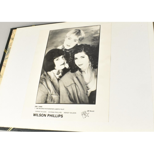 232 - Two Albums Containing Publicity Photographs for Various Bands and Artists, Some Signed