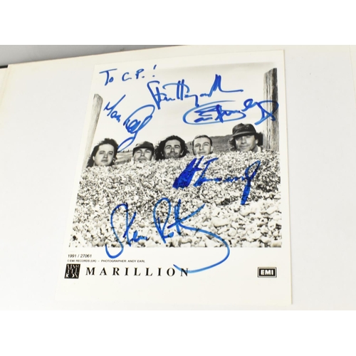 232 - Two Albums Containing Publicity Photographs for Various Bands and Artists, Some Signed