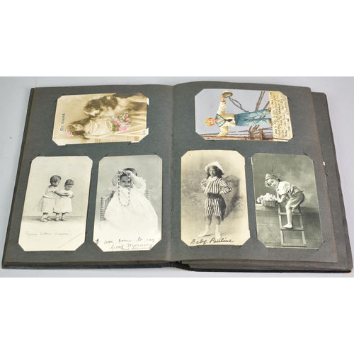 32 - A Postcard Album Containing over 200 Early 20th Century Postcards of Children