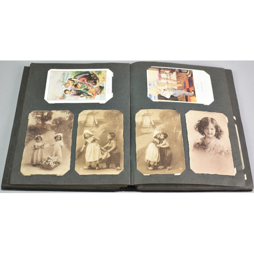 32 - A Postcard Album Containing over 200 Early 20th Century Postcards of Children