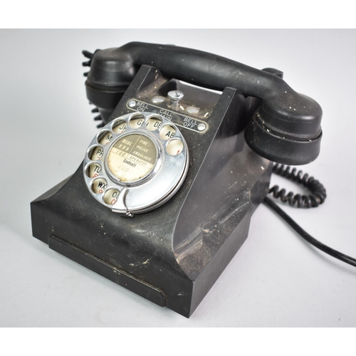 64 - A Vintage Black Bakelite GPO Telephone with Bell On/Off Settings