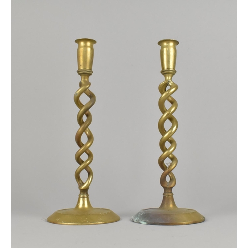 66 - A Pair of Open Spiral Brass Candlesticks, 29cms High