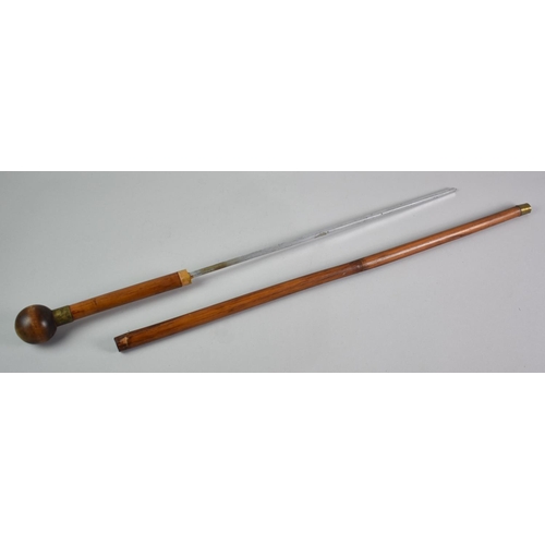 9 - An Early 20th Century Colonial Bamboo Shafted Sword Stick with Ball Handle, 46cms Long Blade