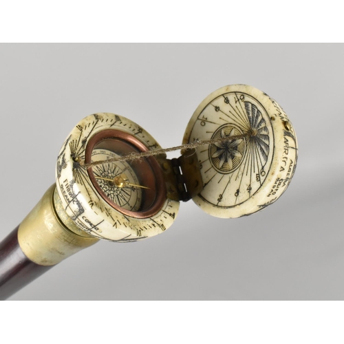 65 - A Reproduction Walking Stick with Faux Bone Finial in the Form of a Globe with Hinged Top To Sundial... 