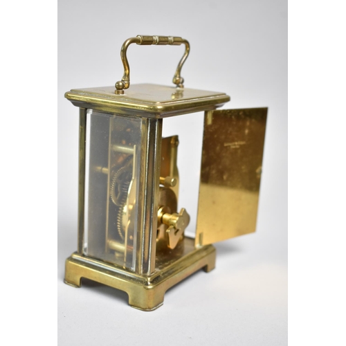 3 - A Mid 20th Century Brass Cased French Carriage Clock, with 8 Day Movement, White Enamelled Dial Insc... 