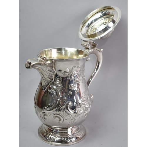 39 - A Large Silver Plated Jug with Repousse Decoration, Probably Elkington, Hinged Lid and Covered Spout... 