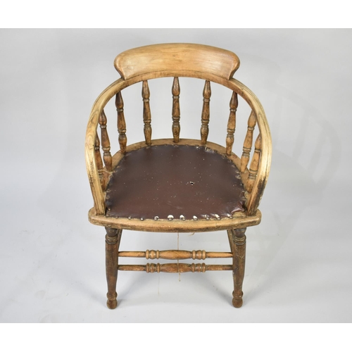 432 - A Smokers Bow Armchair with Spindle Back in Need of Reupholstery