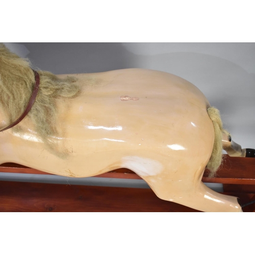 433 - A Large Mid 20th Century Fibreglass Rocking Horse on Wooden Base, 195cms Long