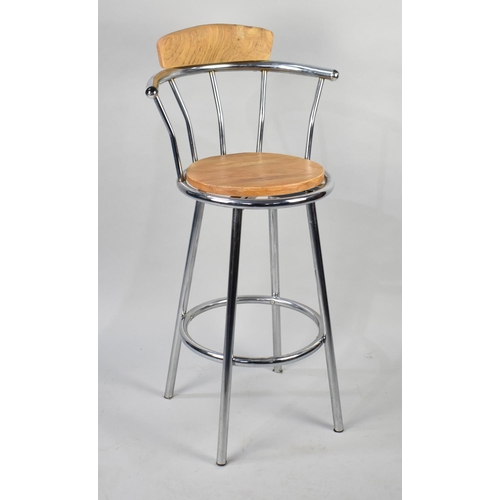 440 - A Modern Chrome Based Kitchen Barstool with Circular Seat