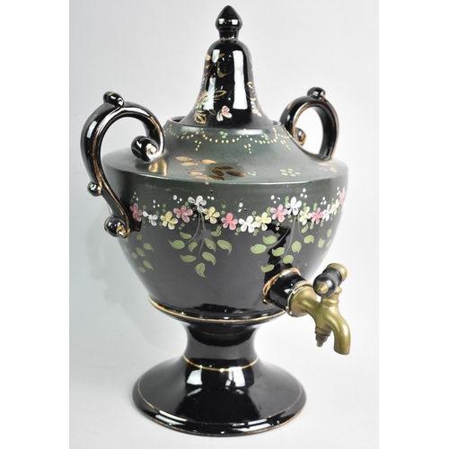 61 - A Late Victorian/Edwardian Jackfield Samovar with Floral Decoration and Brass Tap, 37cms High