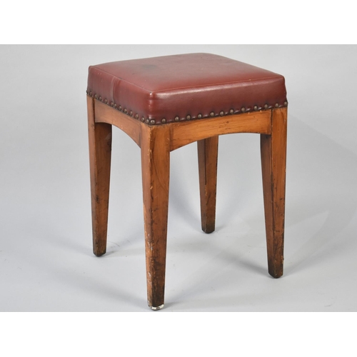 62 - A Vintage Square Topped Leather Upholstered Stool with Brass Studding, 34cms Square and 48cms High