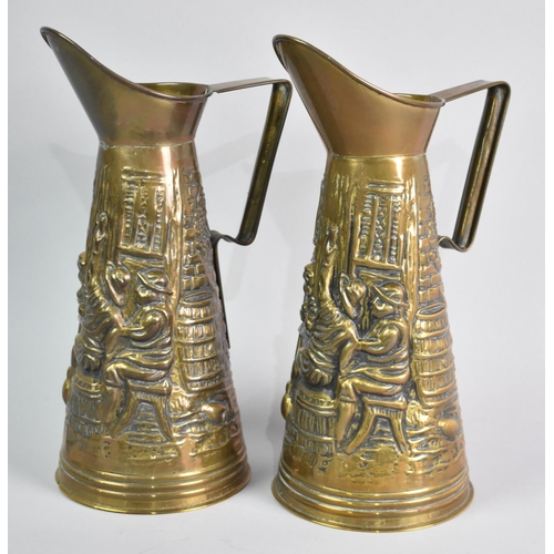 69 - A Pair of Pressed Brass Ewers, Bodies Decorated with Tavern Scenes, 28cms High