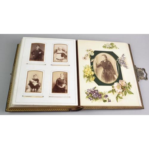 77 - A Late Victorian Photograph Album Containing Monochrome Family Portrait Photographs, Sprung Metal Cl... 