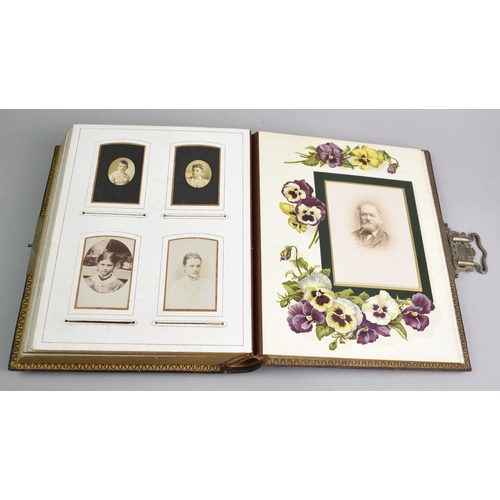 77 - A Late Victorian Photograph Album Containing Monochrome Family Portrait Photographs, Sprung Metal Cl... 