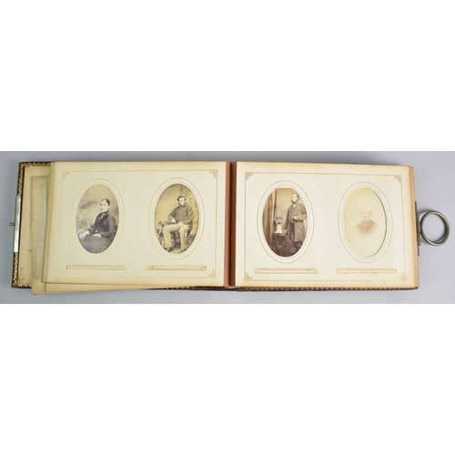 92 - A Late Victorian Photograph Album with Metal Clasp Containing Monochrome Family Portrait Photographs