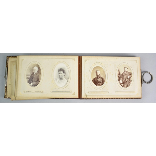 92 - A Late Victorian Photograph Album with Metal Clasp Containing Monochrome Family Portrait Photographs