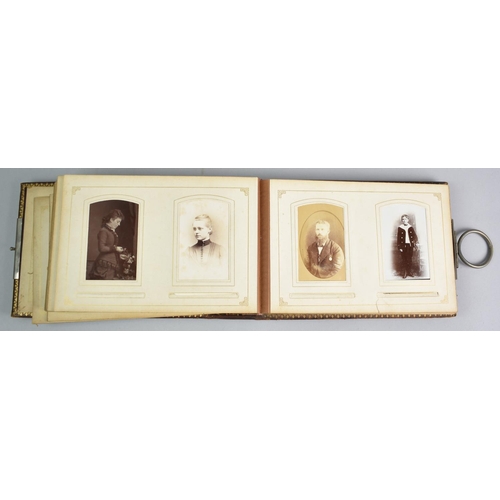 92 - A Late Victorian Photograph Album with Metal Clasp Containing Monochrome Family Portrait Photographs