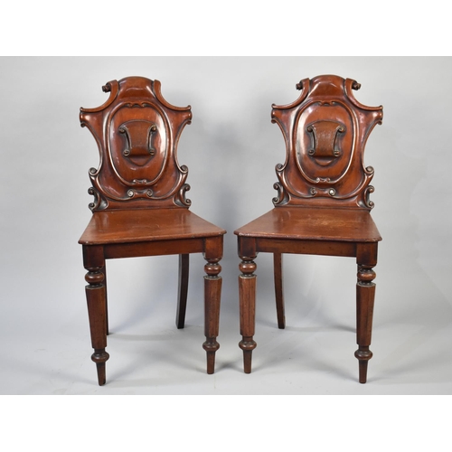 95 - A Pair of Victorian Mahogany Hall Side Chairs with Shield Backs