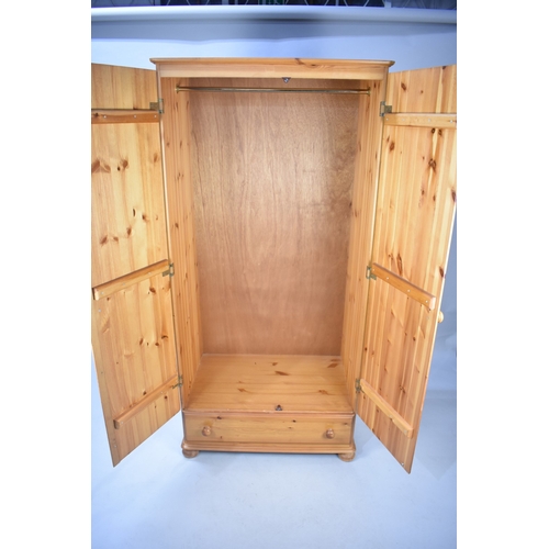 531 - A Modern Pine Wardrobe with Single Base Drawer, 81x52x178cm high