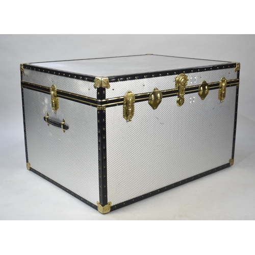 544 - A Large Banded Aluminium Travelling Trunk, 99x76.5x63.5cm