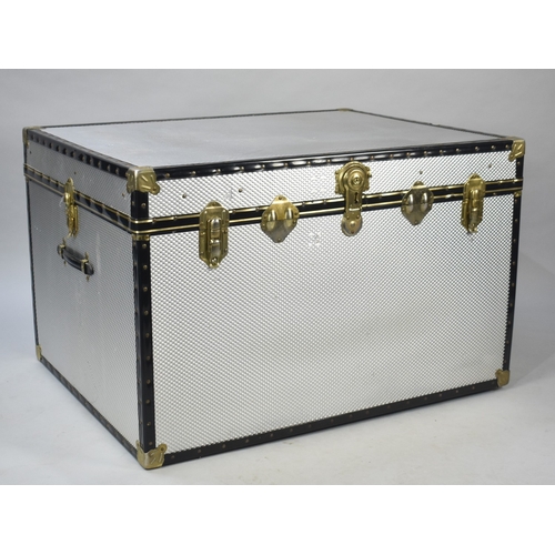 545 - A Large Banded Aluminium Travelling Trunk, 99x76.5x63.5cm