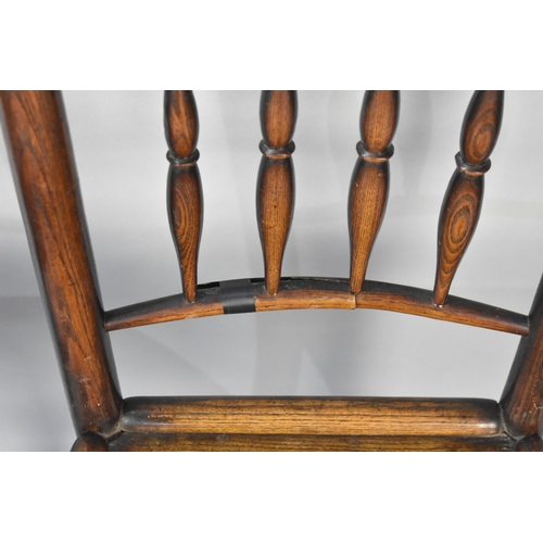 546 - A Set of Four 19th Century Elm Seated Spindle Back Chairs