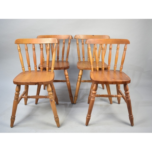 556 - Four Modern Pine Spindle Back Chairs