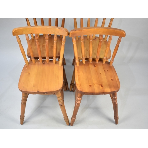 556 - Four Modern Pine Spindle Back Chairs