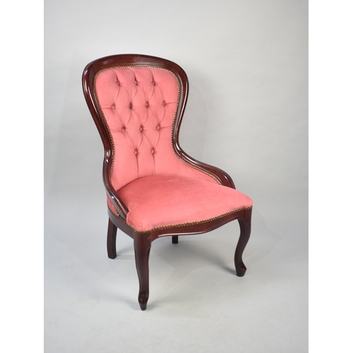 560 - A Reproduction Victorian Mahogany Framed Ladies Chair with Pink Upholstery and Button Back