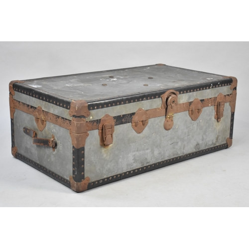 562 - A Vintage Metal Covered Travelling Trunk, 91cms Wide