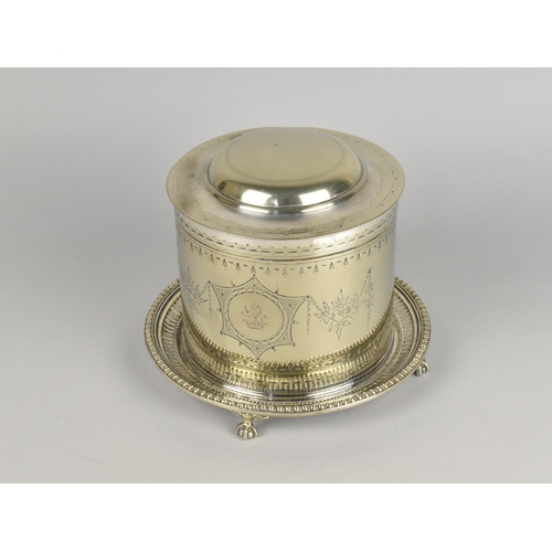 69 - An Edwardian Silver Plated Cylindrical Ice Bucket on Tray Base with Four Claw and Ball feet, Hinged ... 