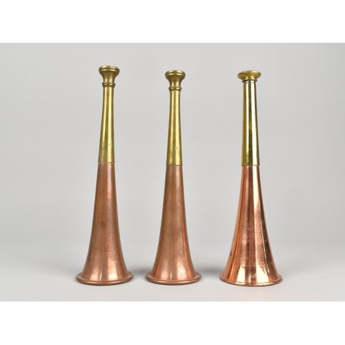 79 - A Collection of Three Vintage Copper And Brass Hunting Horns