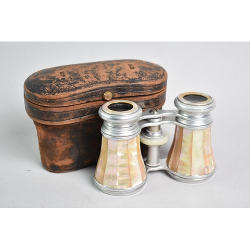 83 - A Pair of Leather Case Mother of Pearl mounted Opera Glasses