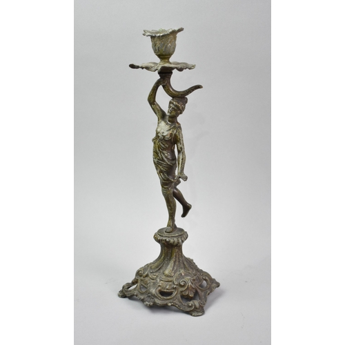 30 - A Spelter Figural Candlestick in the French Style, 27.5cms High